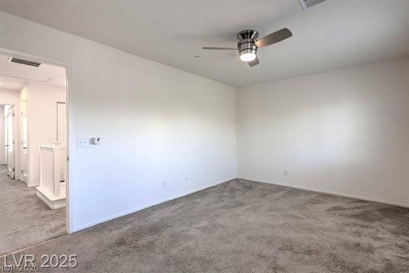 4134 San Cuervo Way, Las Vegas, NV 89115 Plush wall-to-wall carpeting and clean neutral walls anchor this serene second-level bedroom retreat.
