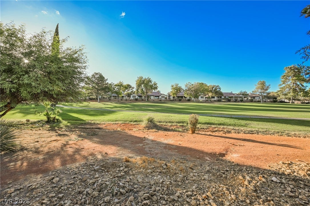 4877 Fiesta Lakes Street, Las Vegas, NV 89130 Expansive fairway views stretch out from this scenic golf course setting.