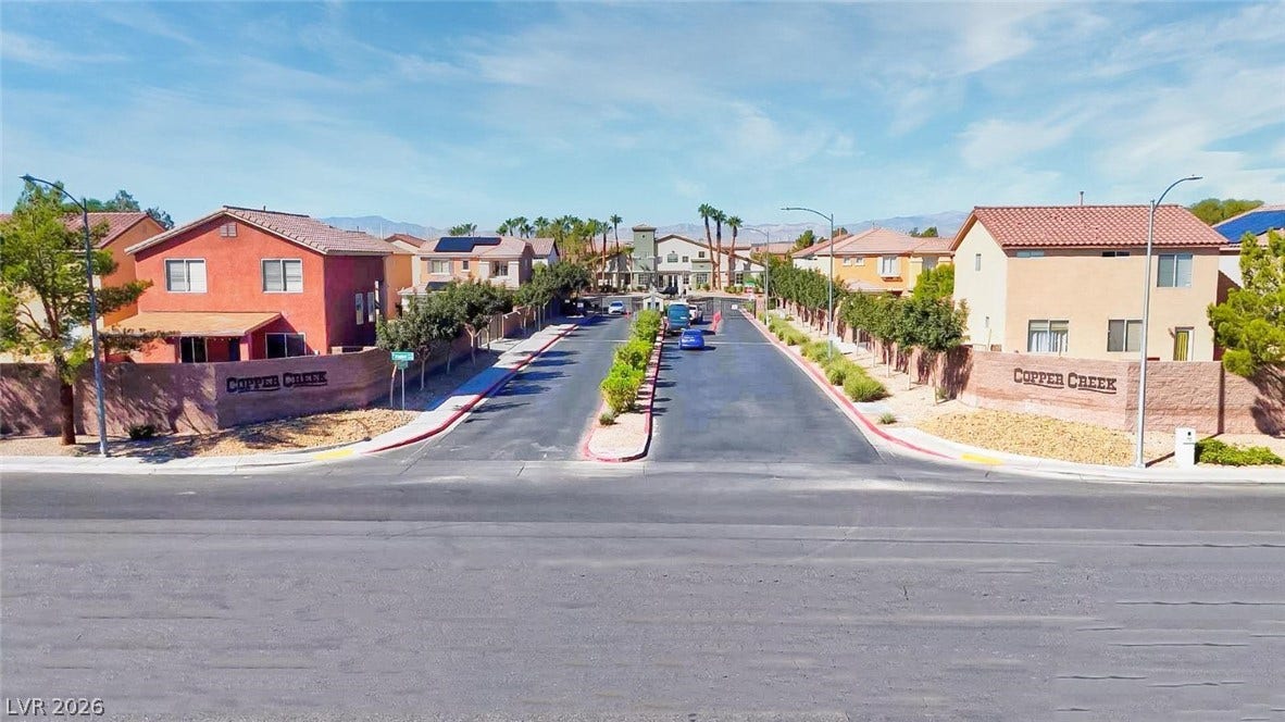 A welcoming gated entrance leads into this master-planned neighborhood surrounded by desert mountain views.
