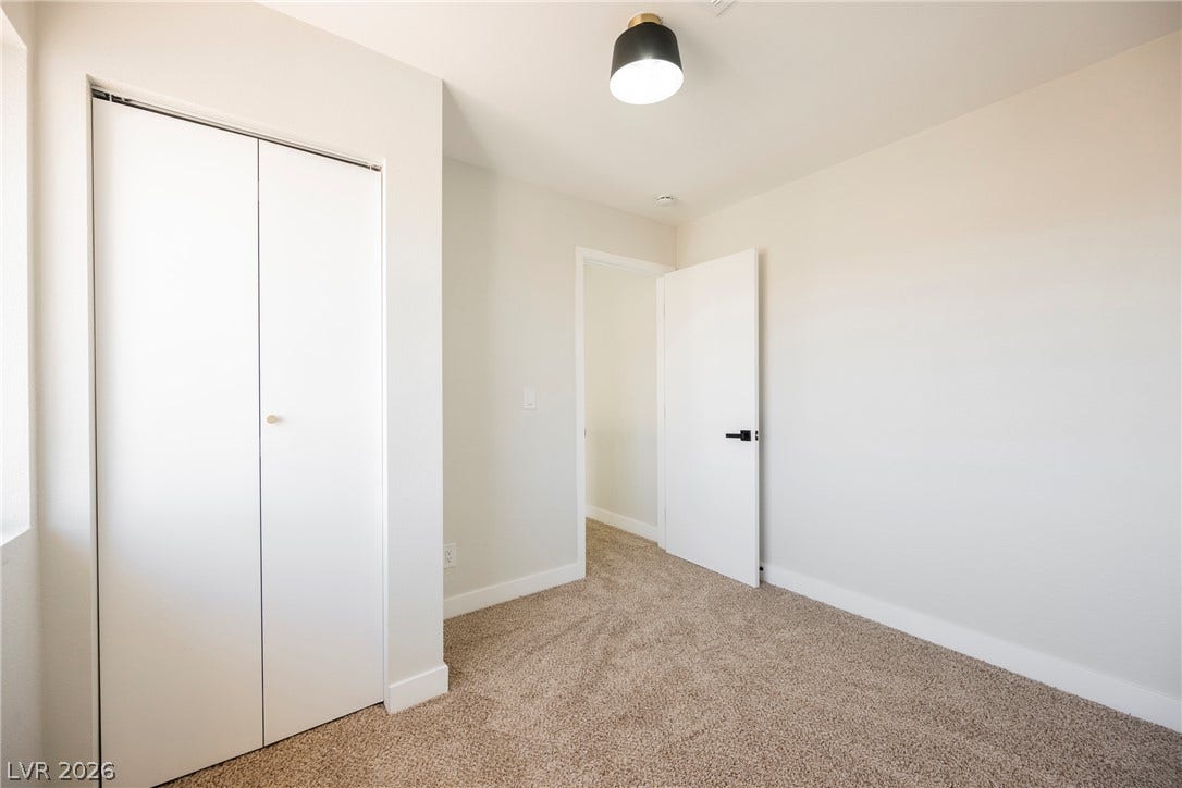 2822 Sesame Drive, Las Vegas, NV 89142 Soft carpeting underfoot and clean lines define this inviting bedroom space.