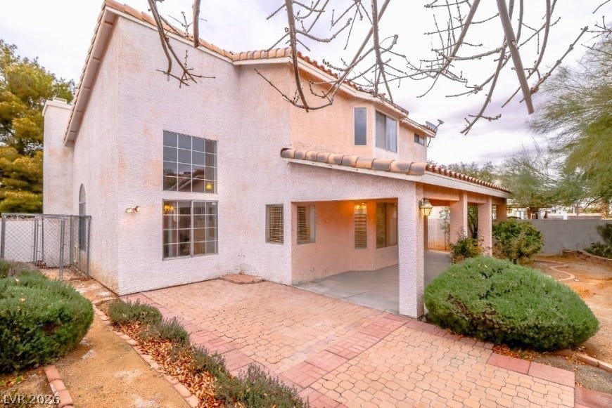 1429 Hawkwood Road, Henderson, NV 89014 A spacious covered patio and brick paver terrace extend the living space outdoors.