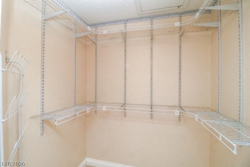 1429 Hawkwood Road, Henderson, NV 89014 Adjustable wire shelving maximizes storage potential in this walk-in closet.
