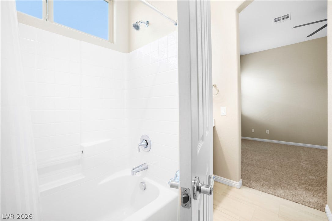 7230 Fresh Harvest Avenue, Las Vegas, NV 89131 Jack & Jill tub & shower combo in between the 2nd and 3rd bathrooms.