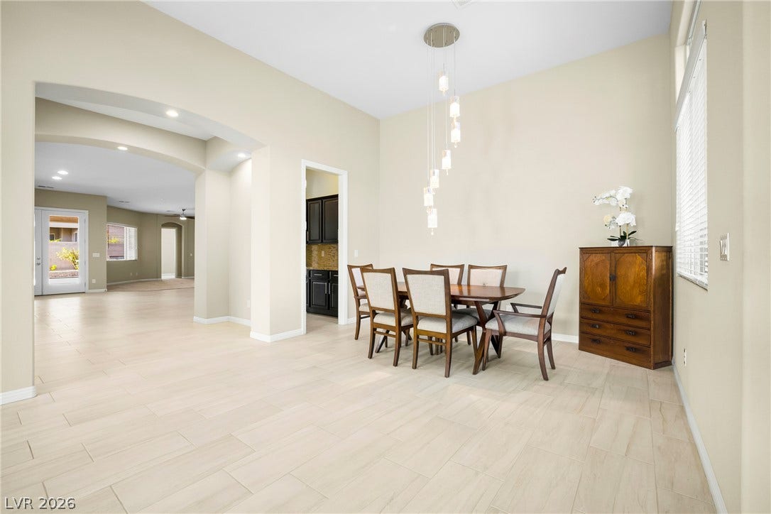 7230 Fresh Harvest Avenue, Las Vegas, NV 89131 A well-lit and welcoming Formal Dining Area.