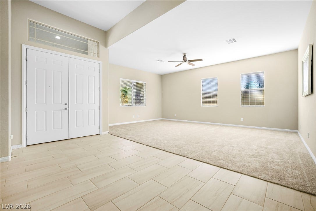 7230 Fresh Harvest Avenue, Las Vegas, NV 89131 Step into this generously proportioned room with modern flooring and ample natural light.