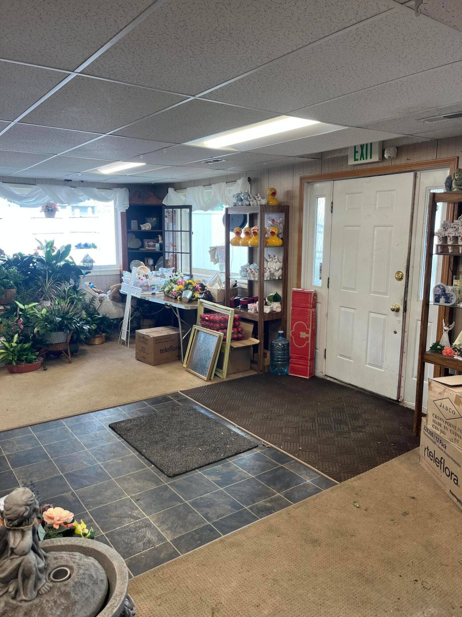 154 Main Street, Crown Point, IN 46307 Main Floor Flower Shop Front door