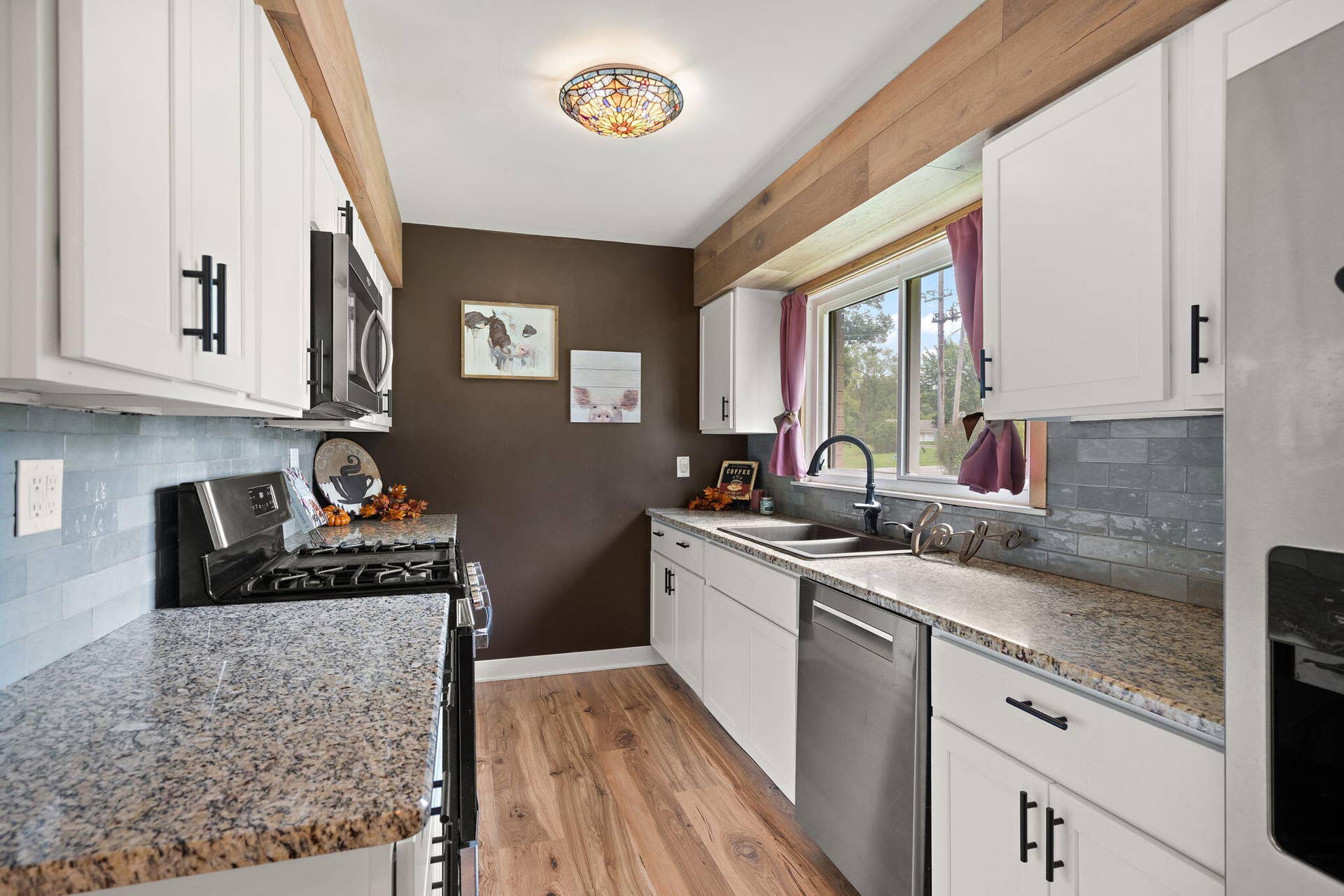 Galley Kitchen with Granite Counter Tops