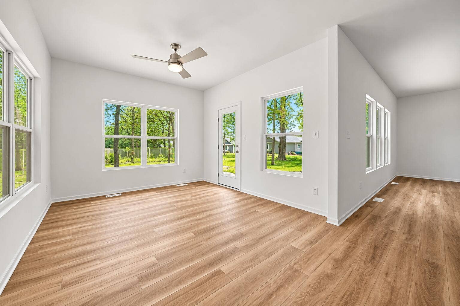 22 Levanno Drive, Crown Point, IN 46307 Sunlit Minimalist Room with Backyard Vie