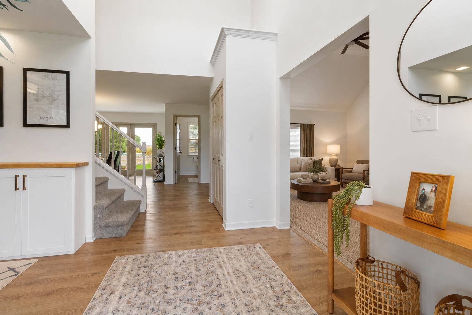 Ivory living room beyond the entryway