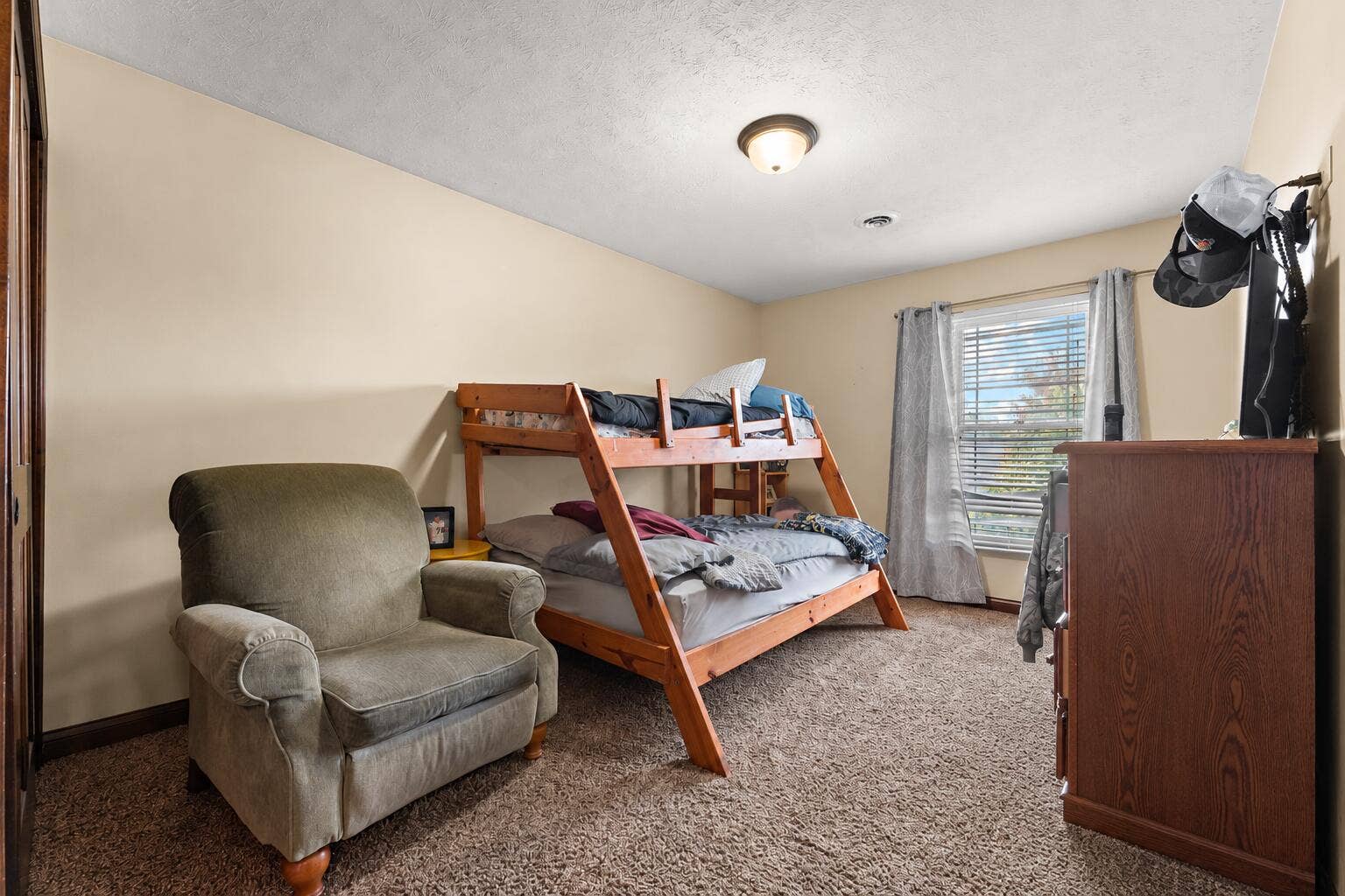 Cozy Bunk Bedroom with Window Light
