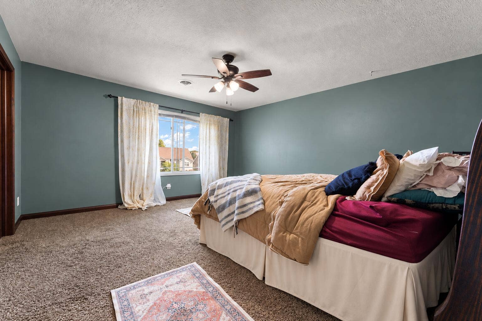 Teal Bedroom with Ivory Bed Skirt