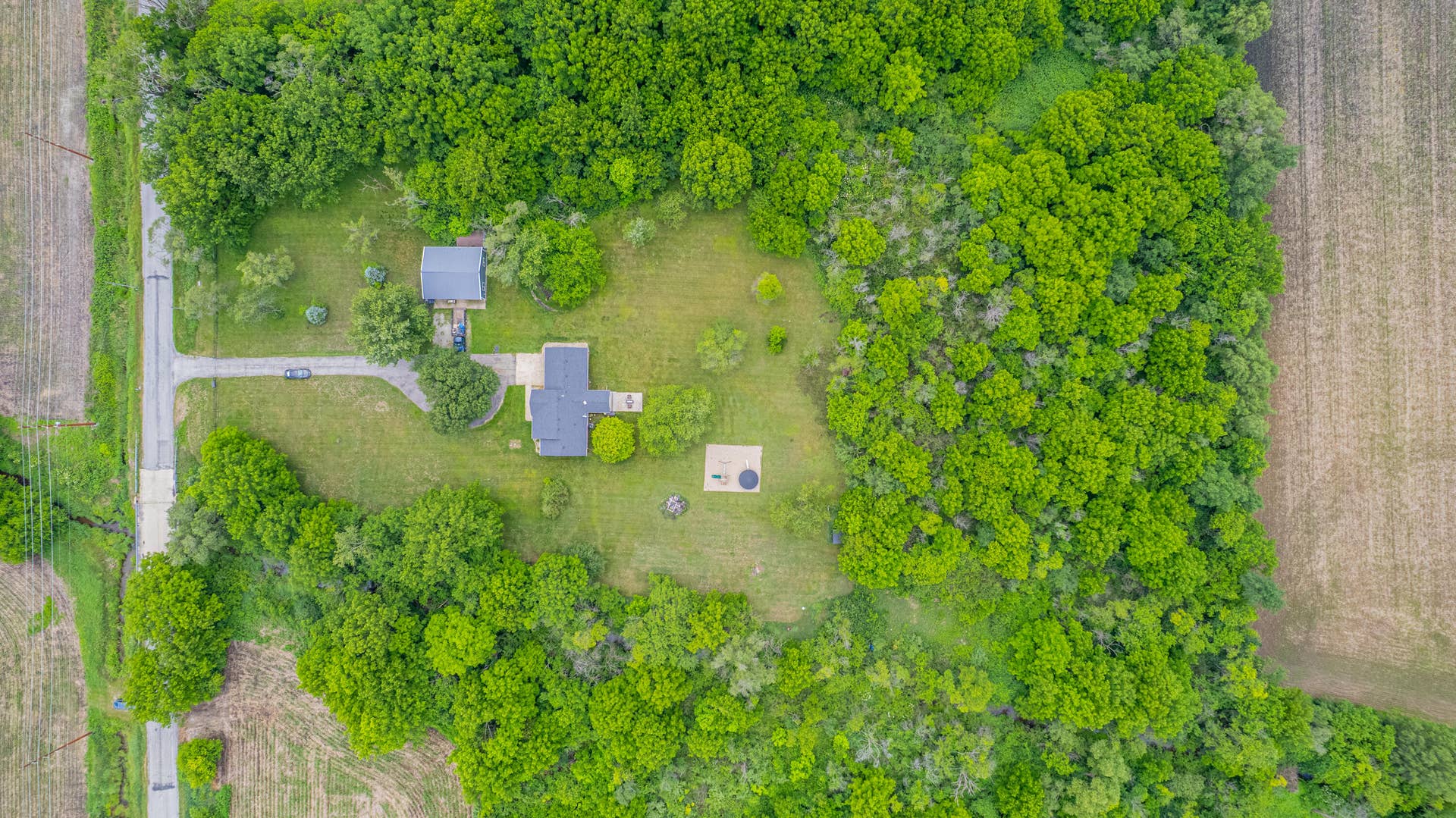 10852 E 100, Wheatfield, IN 46392 Aerial view of home & pole barn