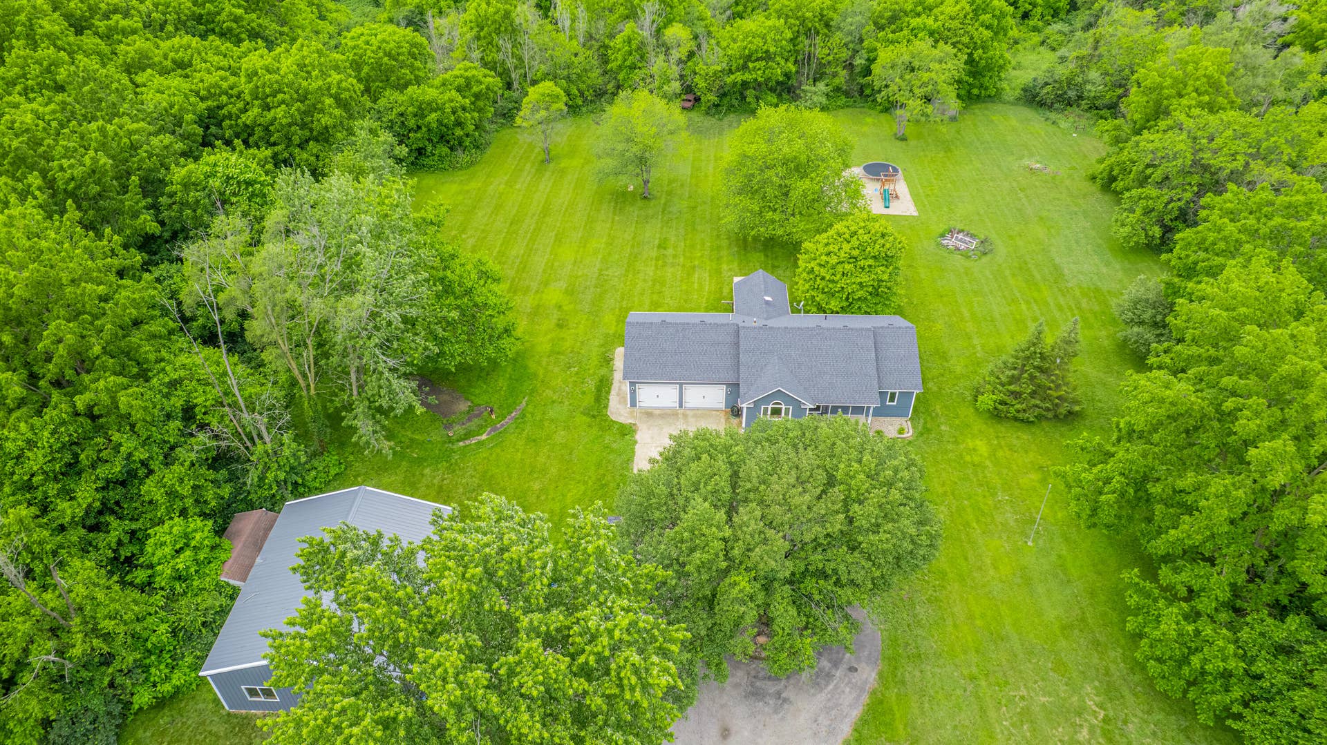 10852 E 100, Wheatfield, IN 46392 Aerial view of home & pole barn