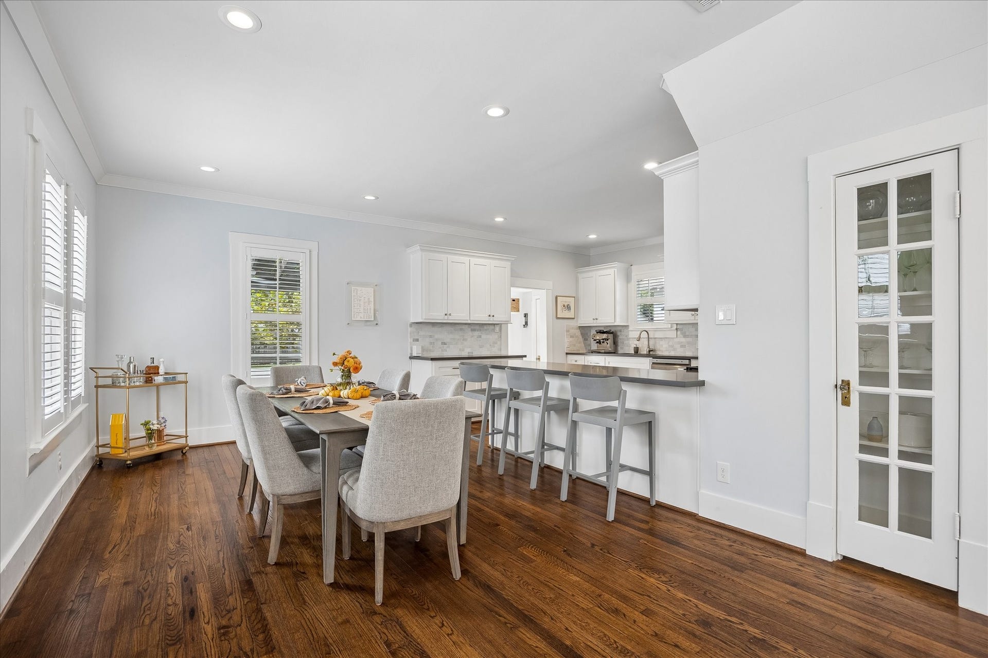 1221 Columbia Street, Houston, TX 77008 The generous dining area sits adjacent to the kitchen, with the perfect glass fronted and shelved closet for formal tableware or other storage. Lighting throughout the property was upgraded to Virtual Comfort.