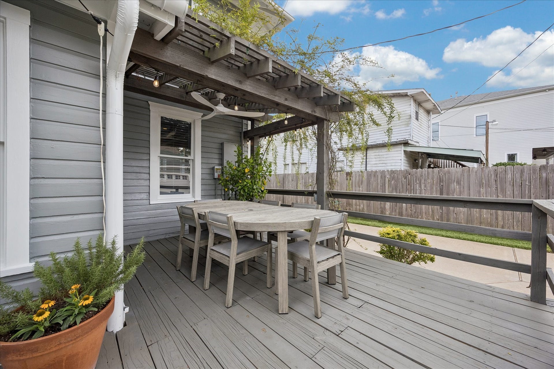 1221 Columbia Street, Houston, TX 77008 Installed by the current owners, the climbing rose covered pergola offers a shaded spot from the sun in the warmer months, an ideal place for an outdoor meal or gathering.