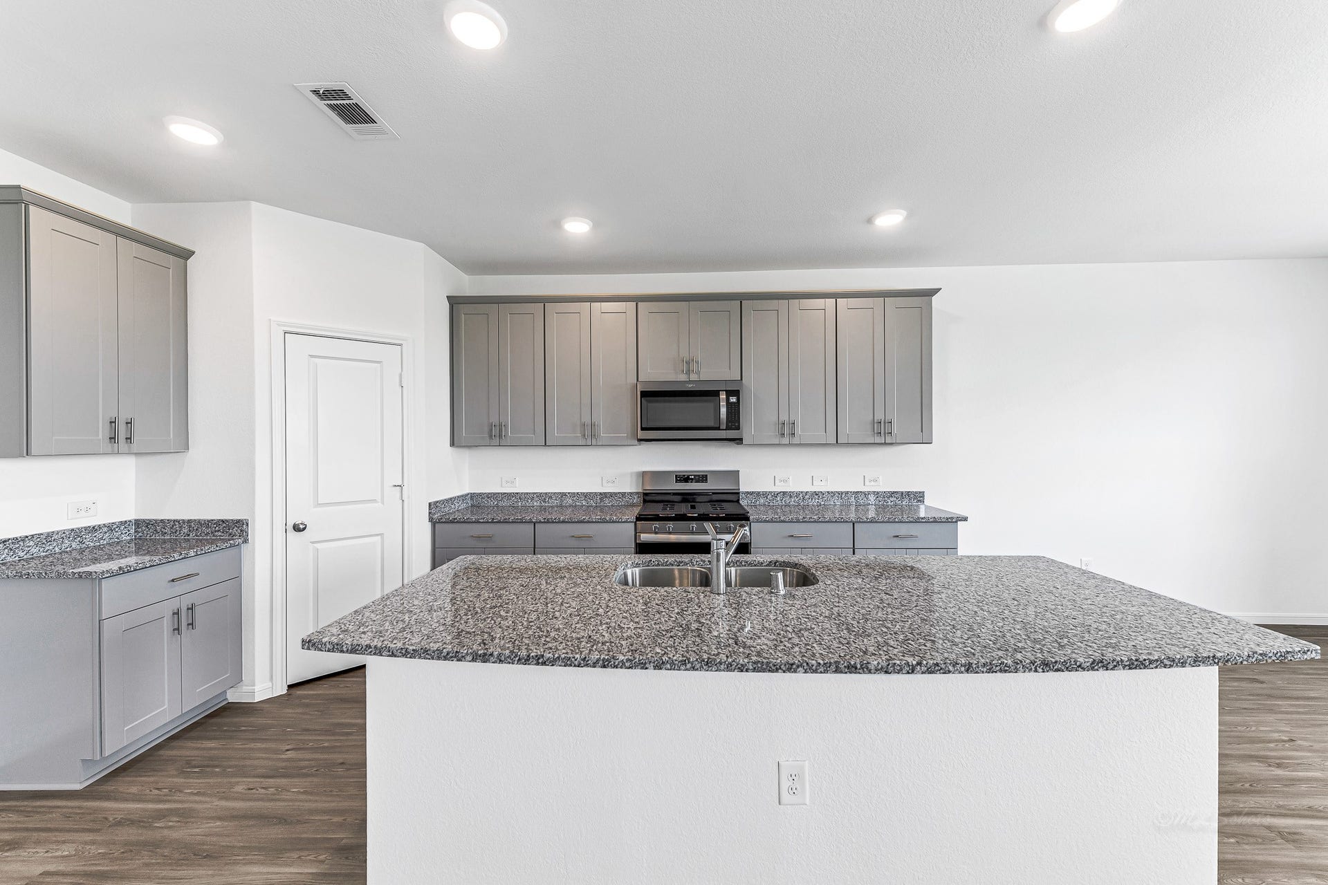 Spacious kitchen with walk-in pantry.