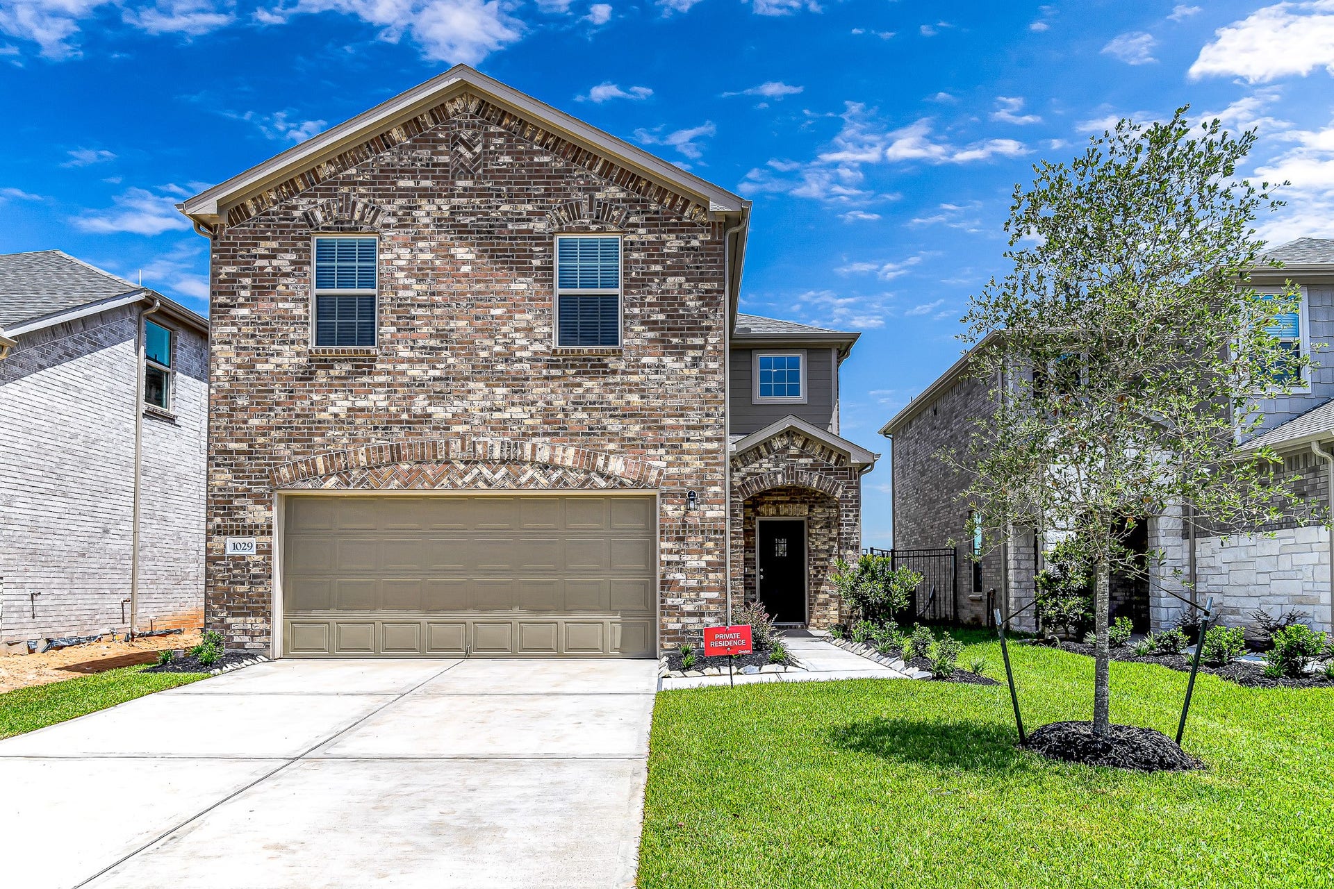 Elegant curb appeal. Brick at all 4 elevations.