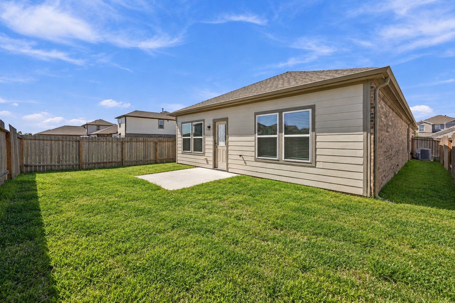 5702 Fresh View Court, Katy, TX 77493 The backyard offers an appealing combination of open green space, privacy fencing, & a conveniently positioned patio. With plenty of room to personalize, this outdoor setting provides an opportunity to create your own retreat. *Grass has been edited.