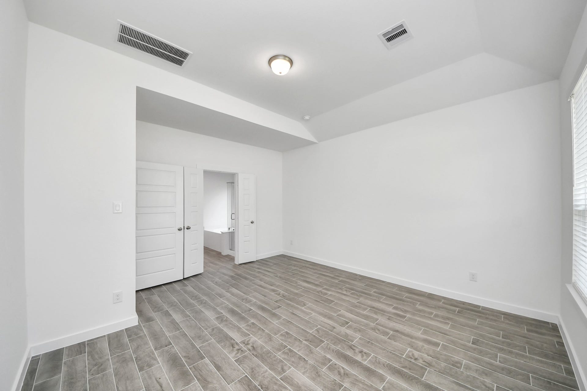 26395 Viva Drive, Magnolia, TX 77355 Escape to tranquility in this spacious primary room.