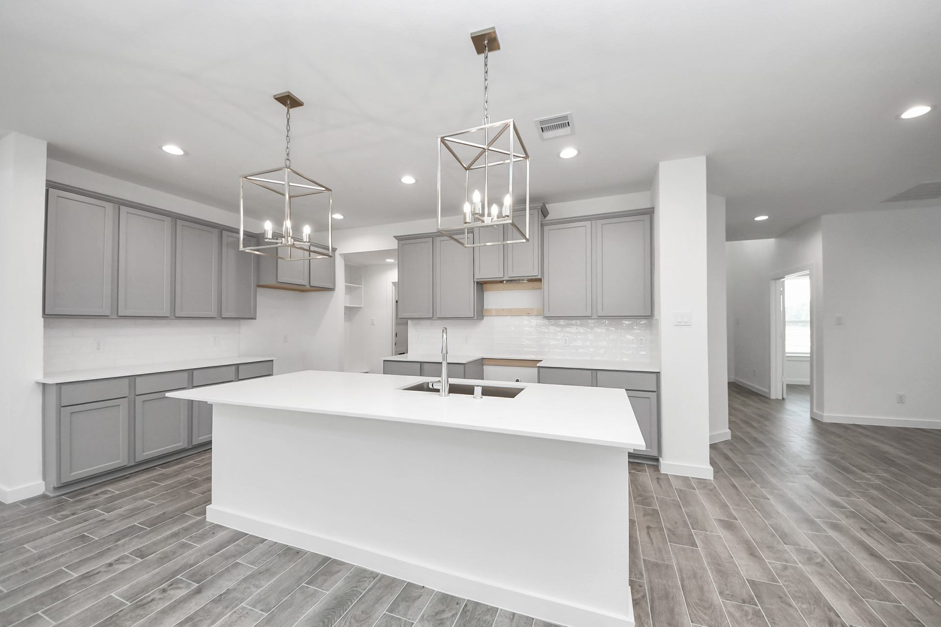26395 Viva Drive, Magnolia, TX 77355 All of this overlooks your expansive family room, creating a perfect space for culinary delights and family gatherings.