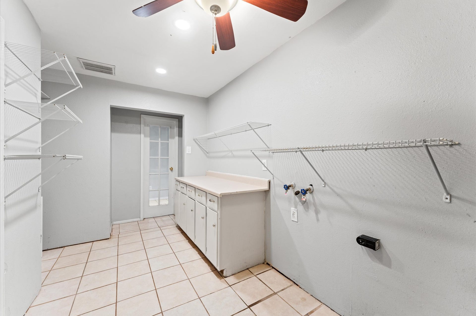 11227 Verlaine Drive, Houston, TX 77065 Lots of built-in shelving, counter space, and cabinets!