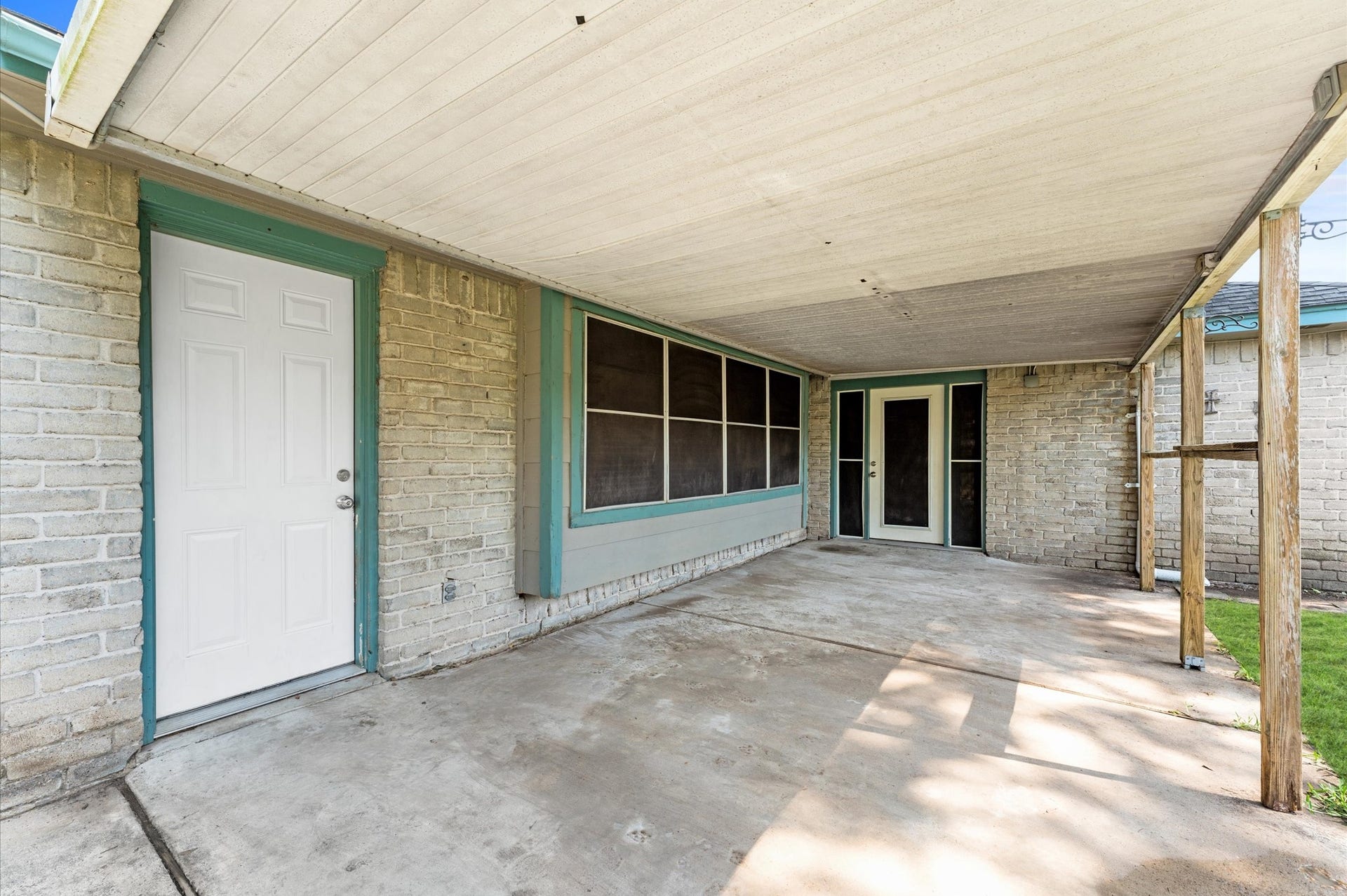 11227 Verlaine Drive, Houston, TX 77065 The door on the left opens to the living room, while the door at the far end is a private patio entrance from the primary suite.