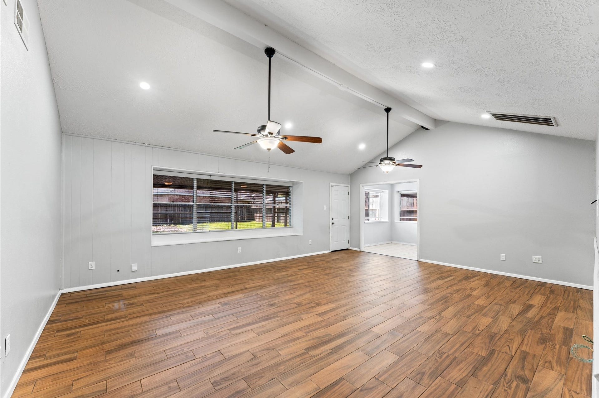 11227 Verlaine Drive, Houston, TX 77065 Same view of the living/dining room without furniture.