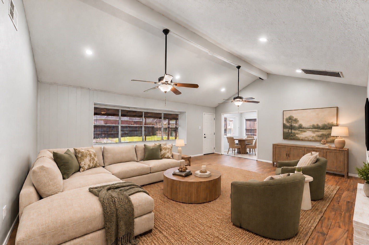 11227 Verlaine Drive, Houston, TX 77065 Living room opens to breakfast area. Room is virtually staged.