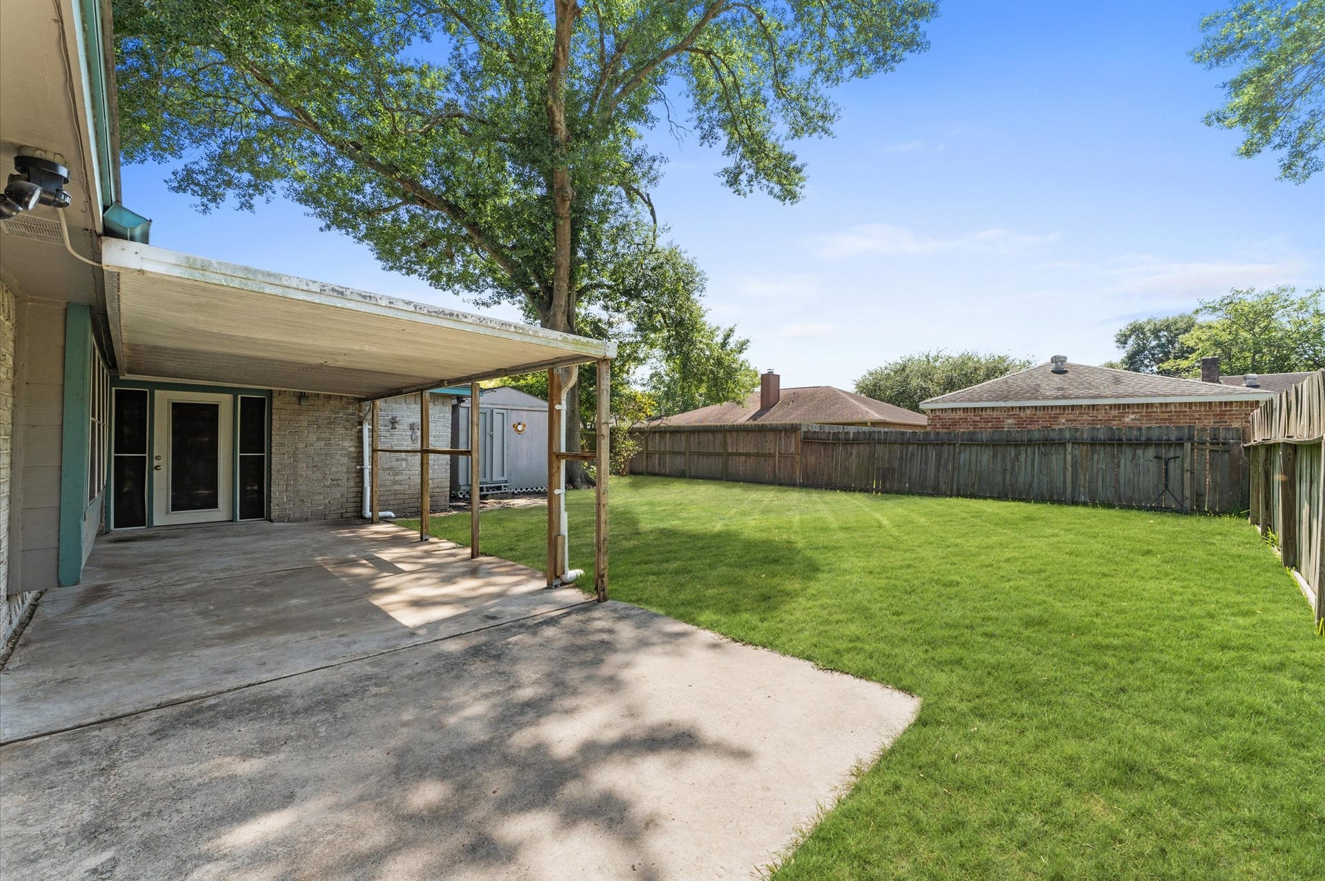 11227 Verlaine Drive, Houston, TX 77065 Enjoy a view of your backyard from the covered patio.