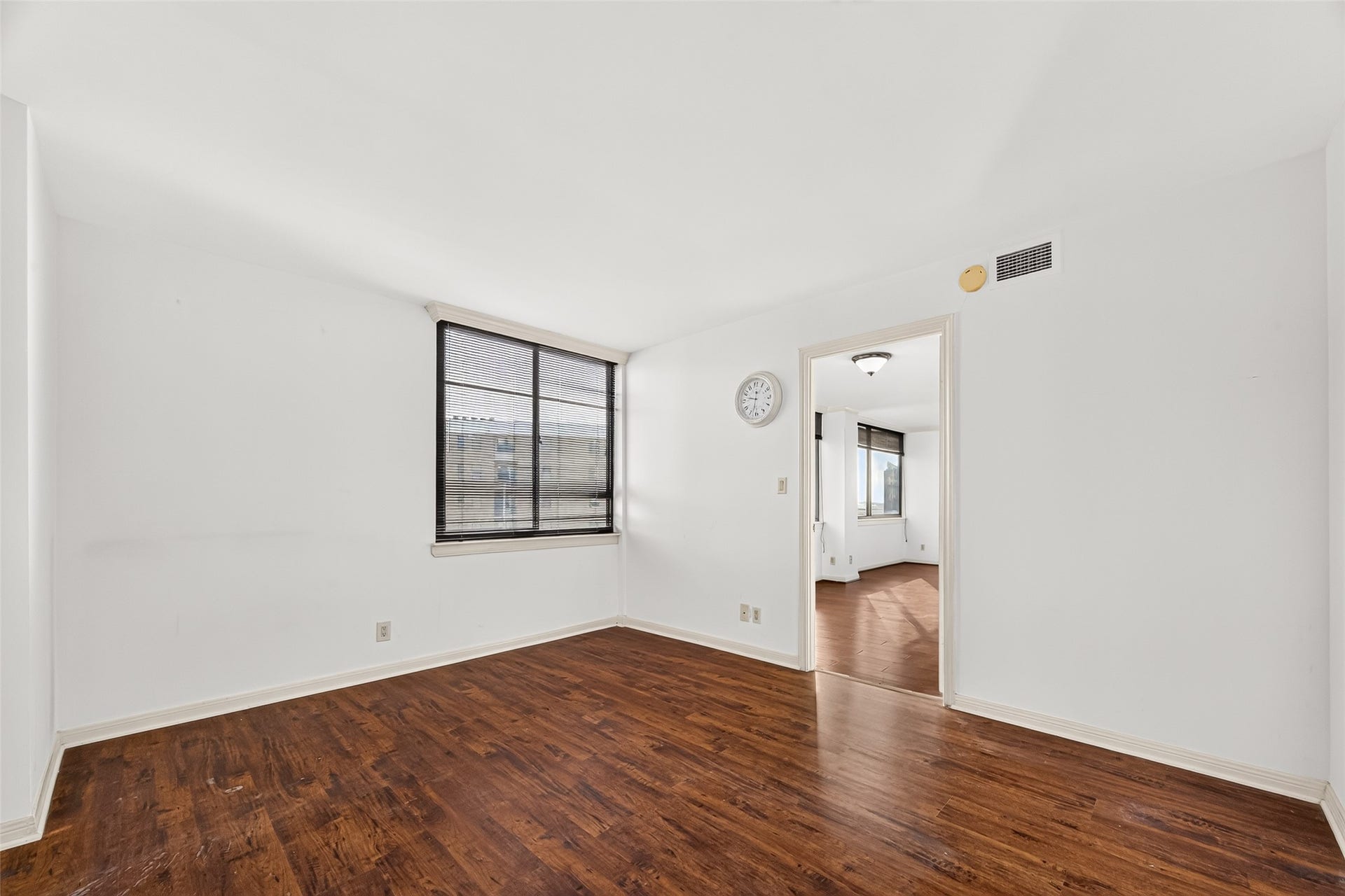 3525 Sage Road, #704, Houston, TX 77056 Primary bedroom located outside the dining area with views into the courtyard