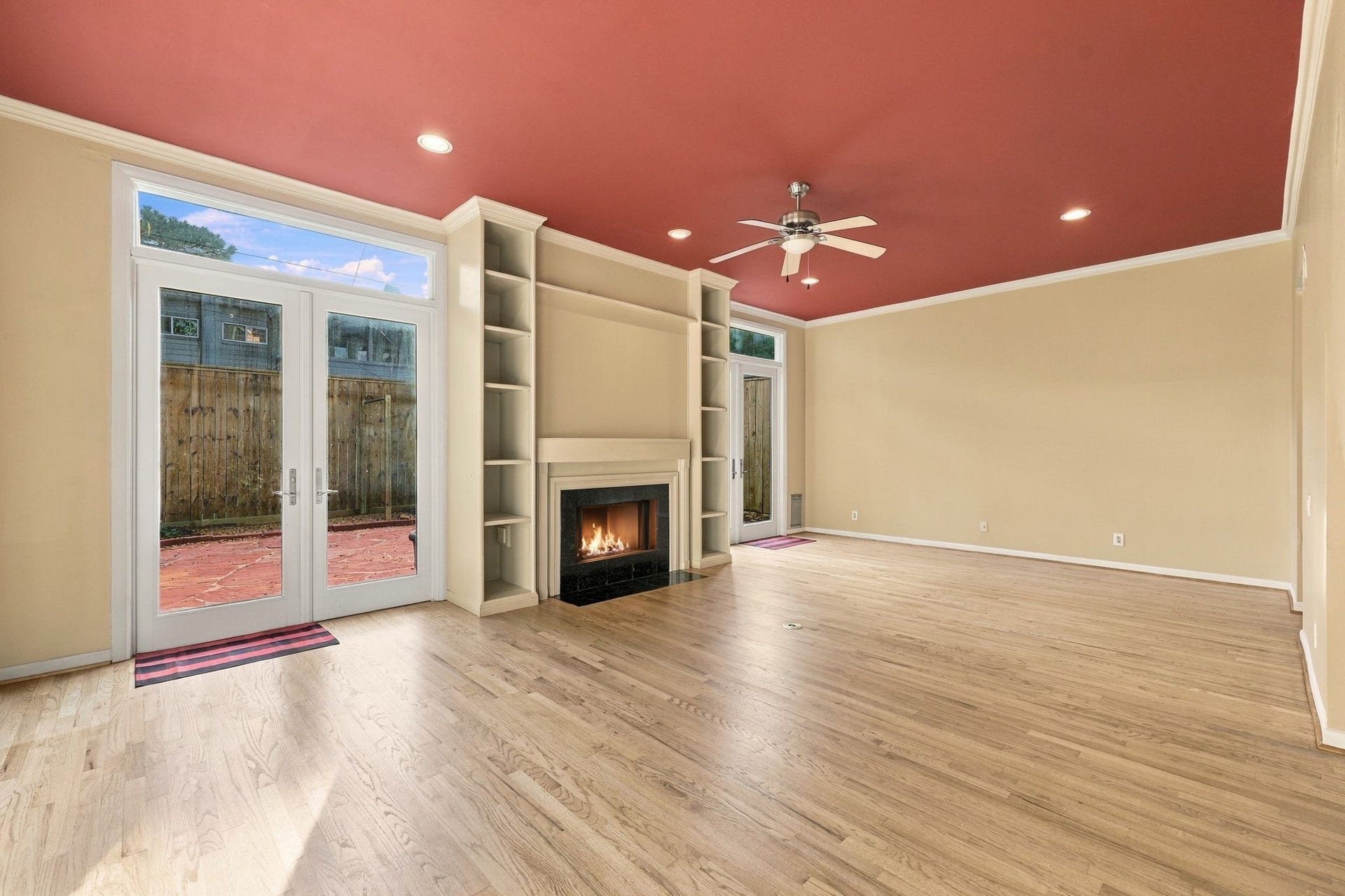 6205 Westcott Street, Houston, TX 77007 1st Floor: view of fireplace and entrance to backyard.