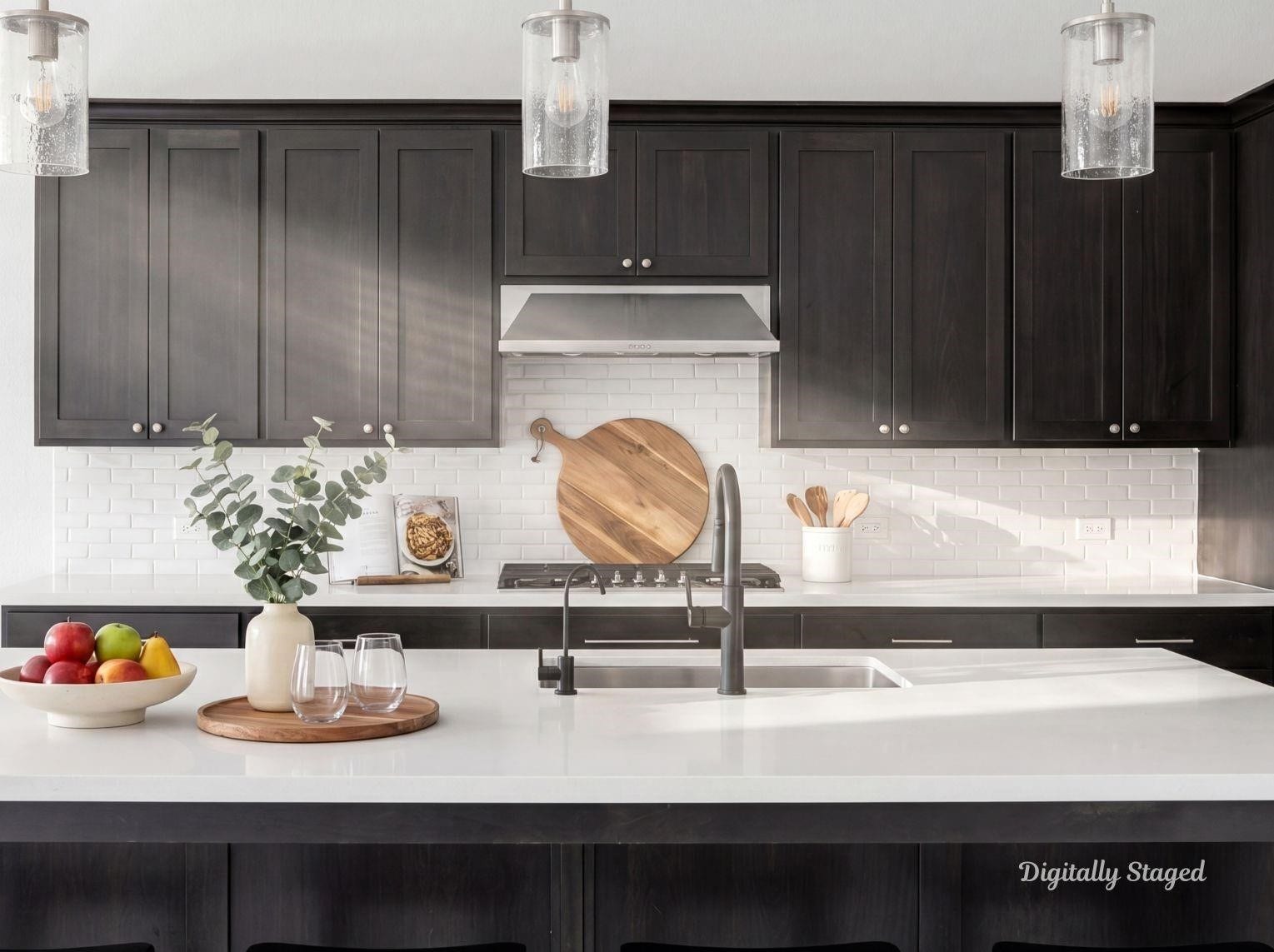 1715 Divino Pass, Conroe, TX 77304 A modern kitchen featuring a large
center island with breakfast bar
seating, rich espresso cabinetry,
white subway tile backsplash, and
polished stone flooring. This photo
has been digitally staged to illustrate
the possibilities of the homes
aesthetic and potential design. Some
furnishings and dcor shown are for
visual inspiration.
