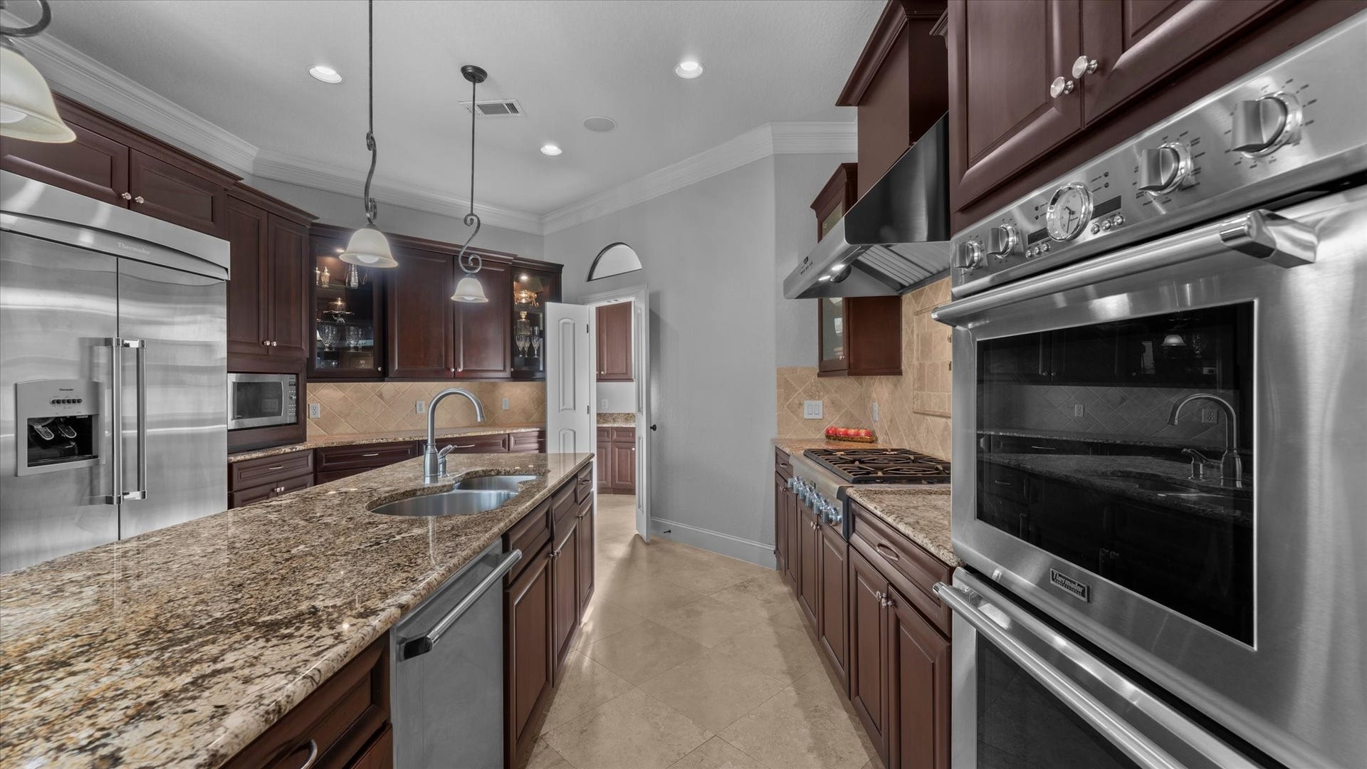 19182 Grandview Point, Montgomery, TX 77356 The kitchen is large with lots of counter space. Thermador refrigerator.
