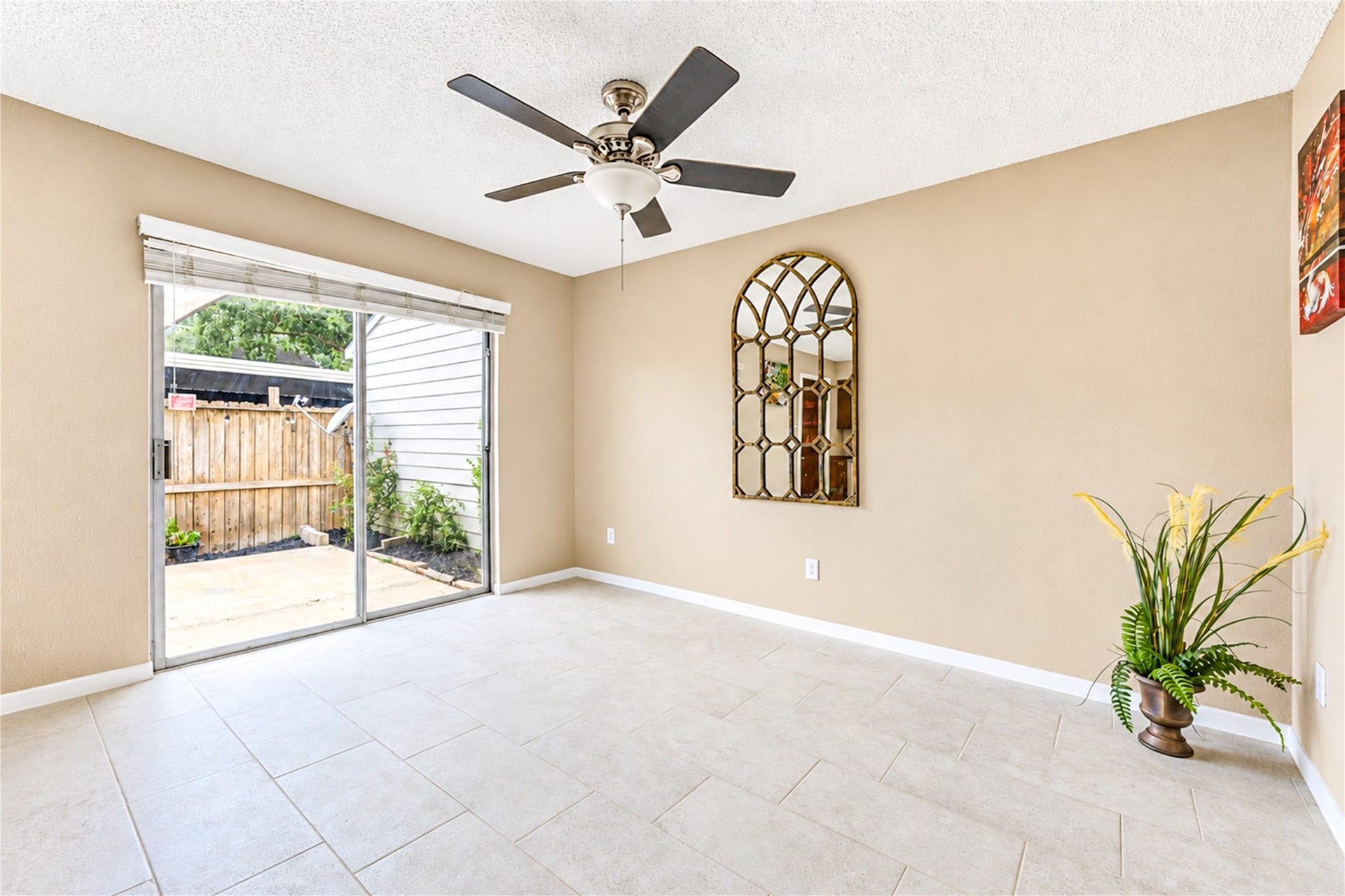 9265 Westwood Village Drive, #49, Houston, TX 77036 Sliding glass door leads to the private back patio