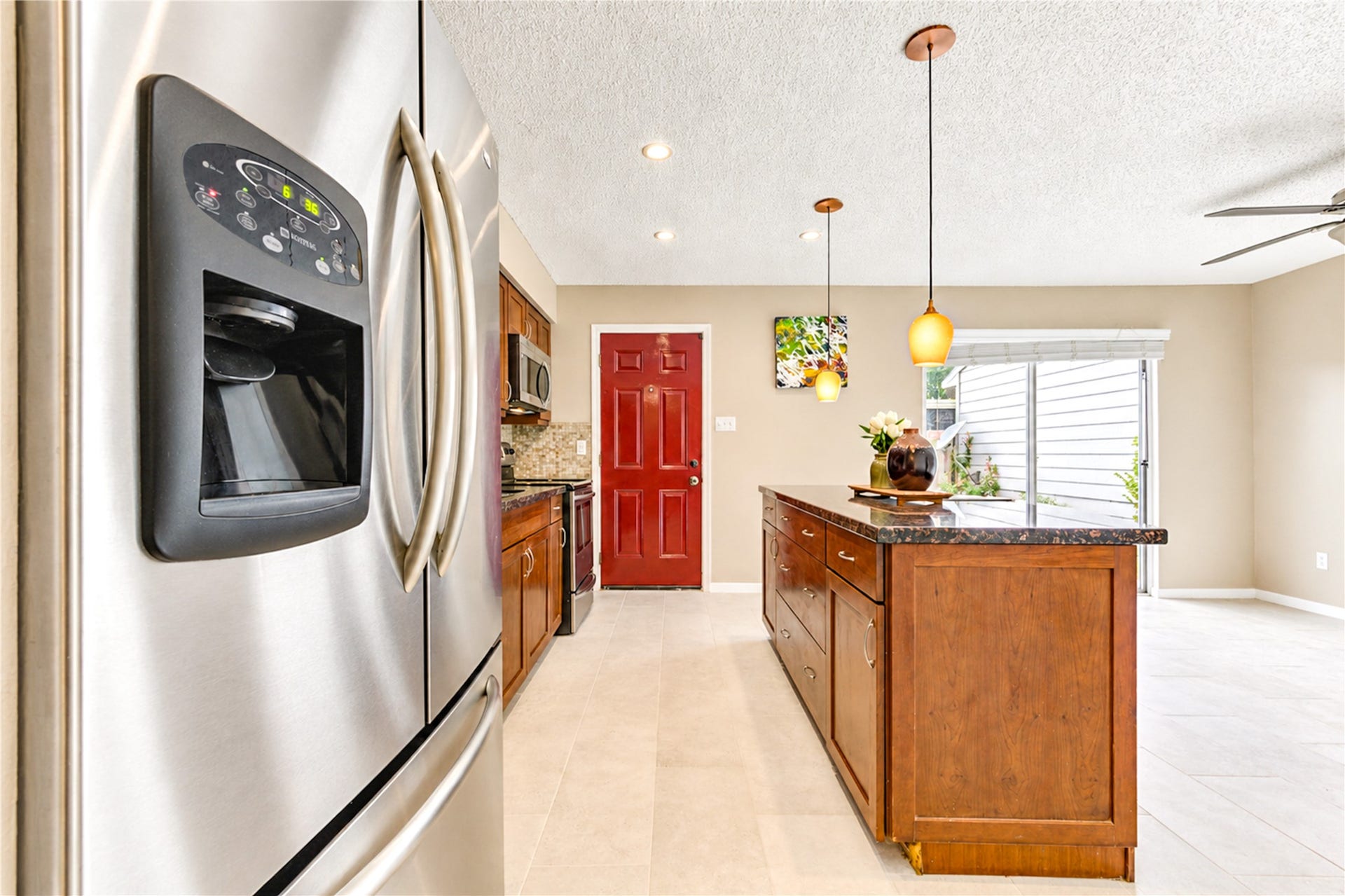 9265 Westwood Village Drive, #49, Houston, TX 77036 Stainless steel refrigerator is included in the lease
