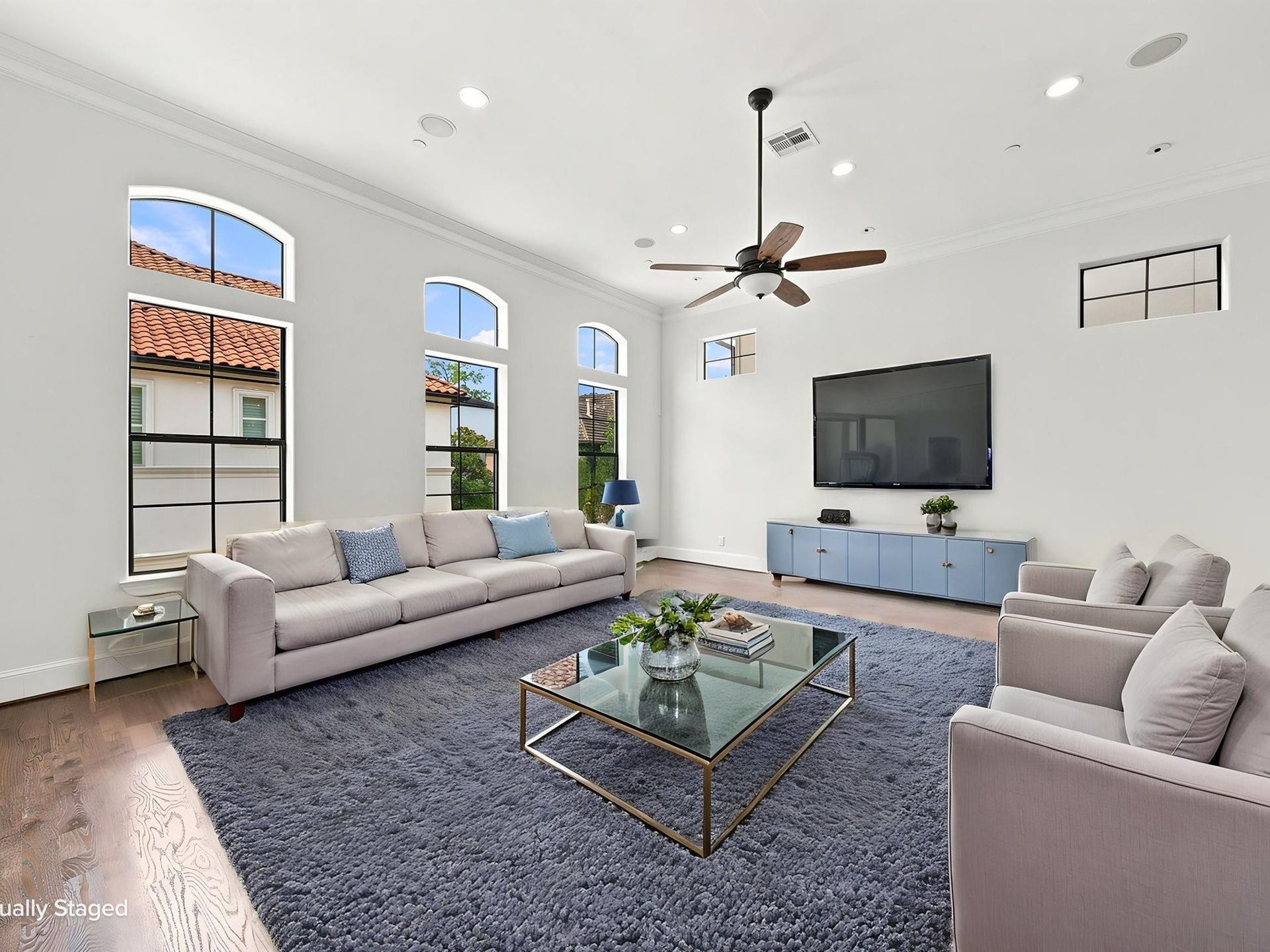 911 Queen Annes Road, Houston, TX 77024 Second Floor Living Room Virtually Staged