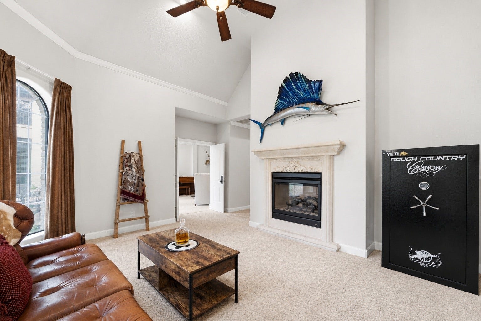 4903 Westerdale Drive, Fulshear, TX 77441 Whether used as a sitting room, reading nook, or work-from-home space, this versatile retreat is anchored by a beautiful two-sided gas fireplace shared with the primary bedroom.