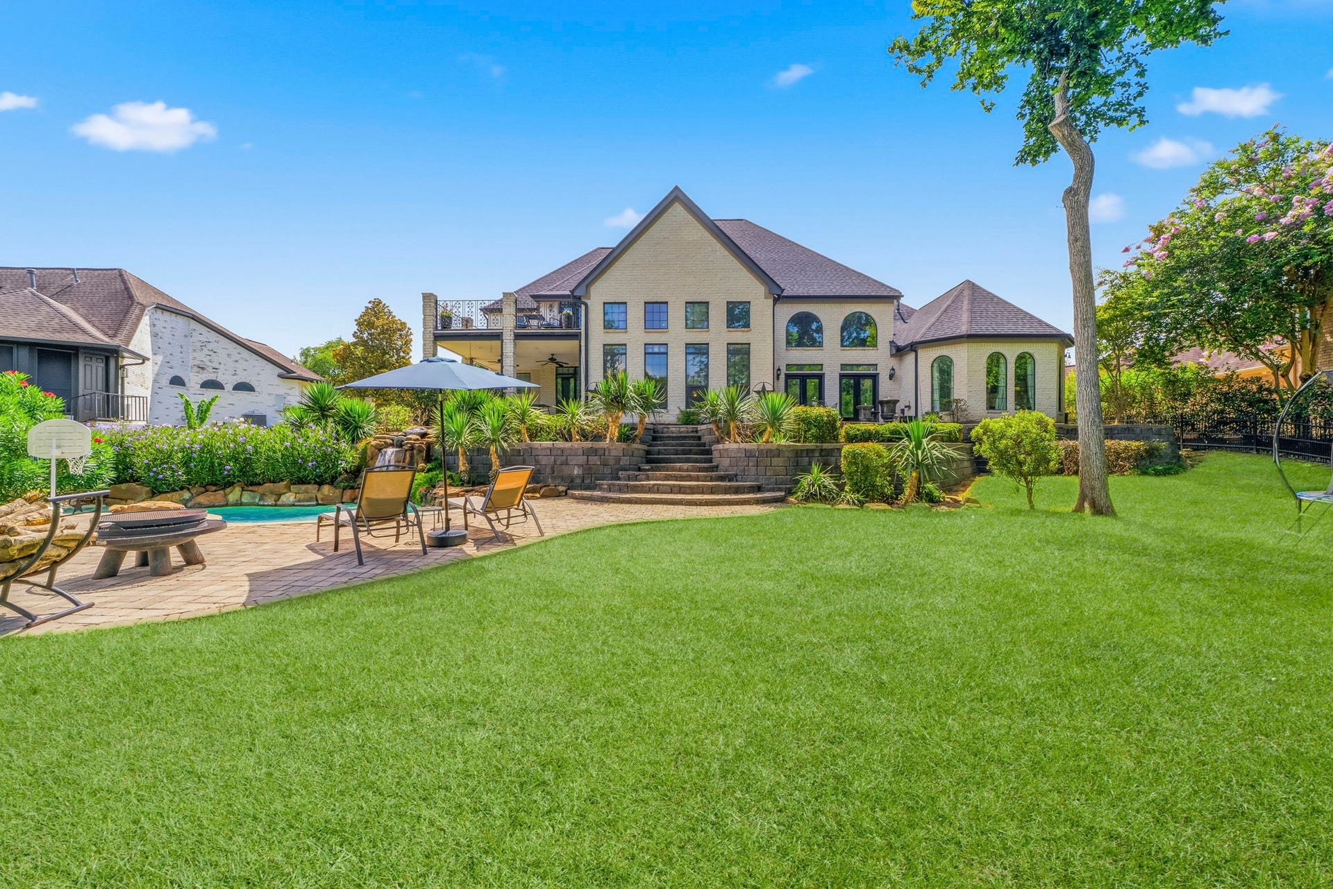 4903 Westerdale Drive, Fulshear, TX 77441 Plenty of room to entertain, relax, or play with a huge backyard that extends all the way to the canal.