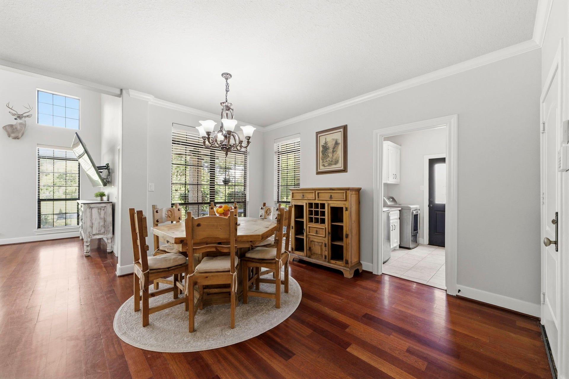 4903 Westerdale Drive, Fulshear, TX 77441 Adjacent to the kitchen, the spacious 14' x 12' breakfast area easily accommodates a large dining table while offering views of the backyard and convenient access to the utility room.