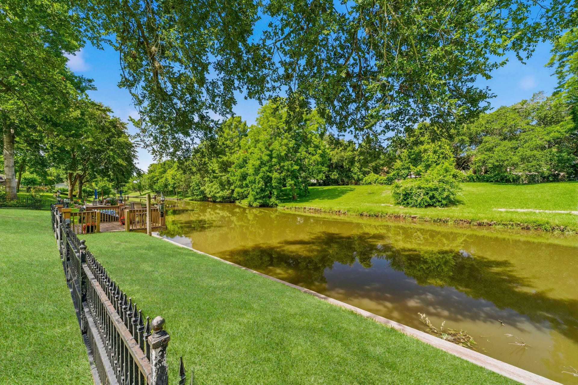 4903 Westerdale Drive, Fulshear, TX 77441 Approximately 103 feet of canal frontage provides peaceful water views and direct access to your private dock.