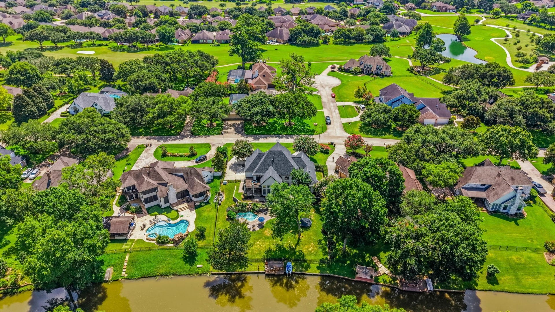 4903 Westerdale Drive, Fulshear, TX 77441 You can see the Weston Lakes Country Club in the background. Golf cart ride to the clubhouse!
