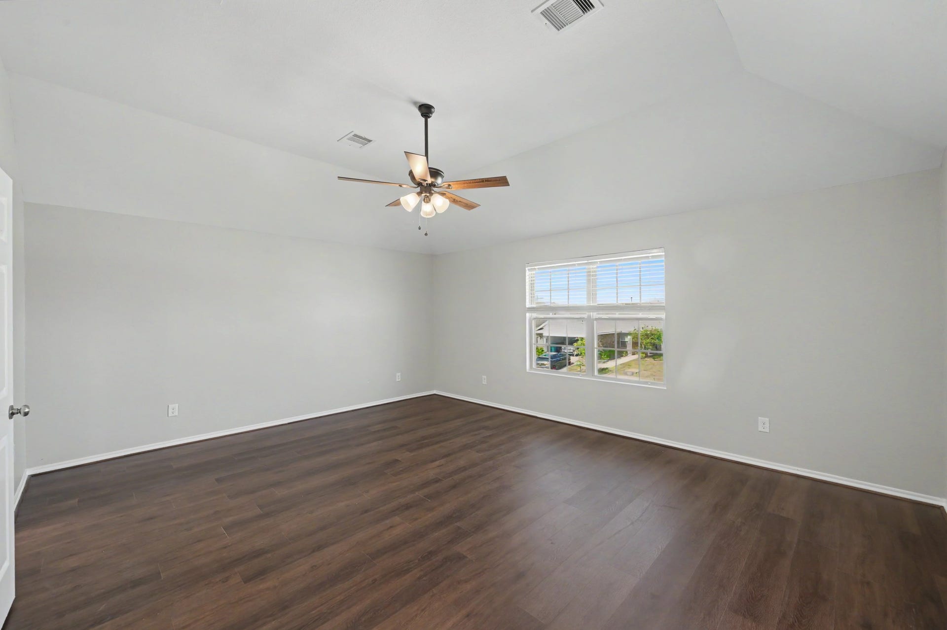 Additional view of spacious primary bedroom.