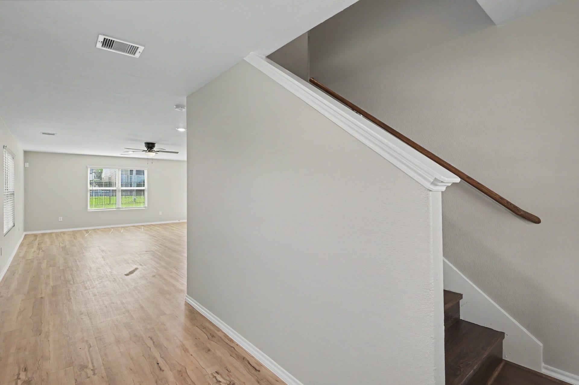 Open layout flows seamlessly into the spacious family room.