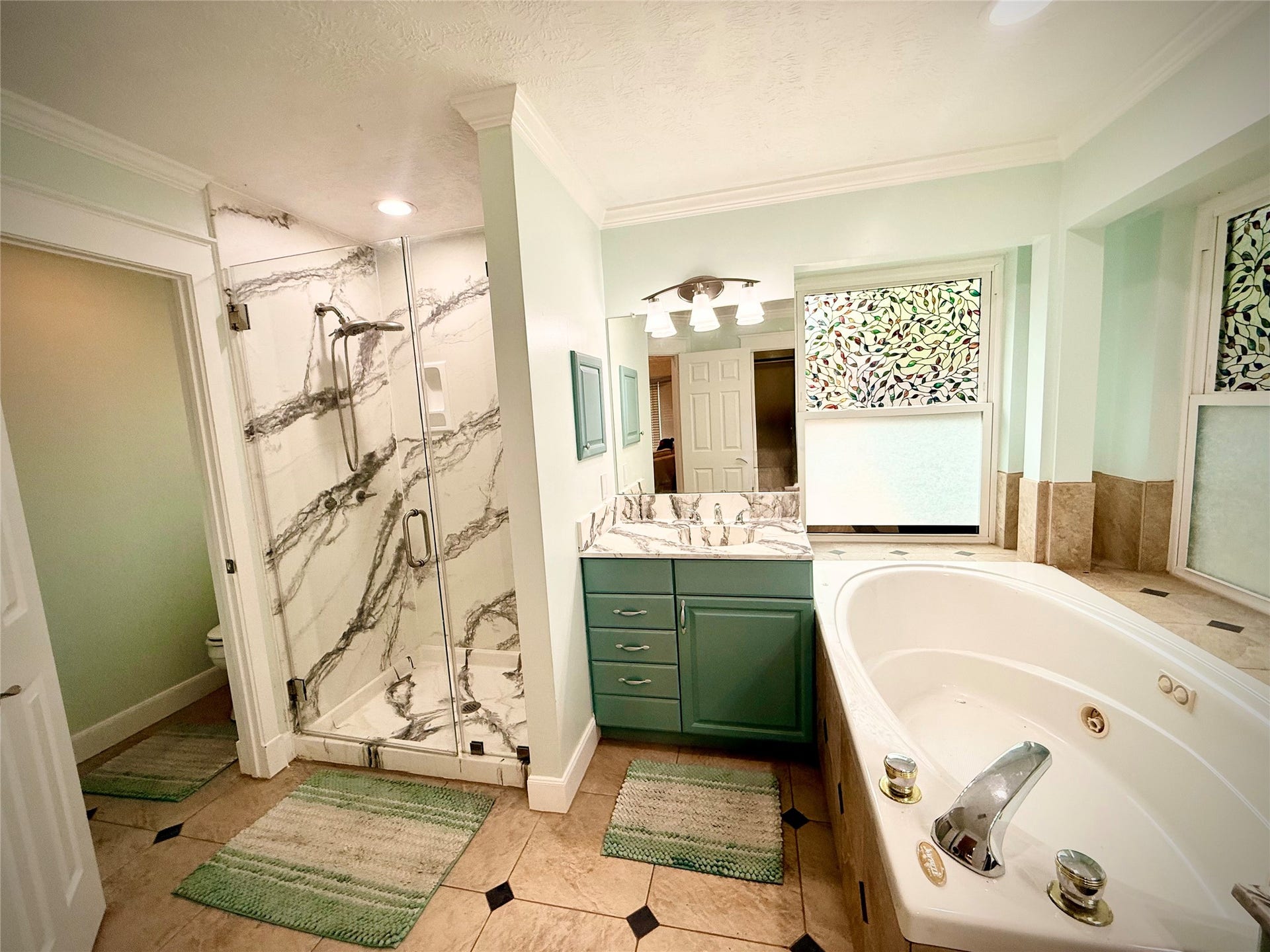 1309 Piney Woods Drive, Friendswood, TX 77546 Primary bath with two sink areas