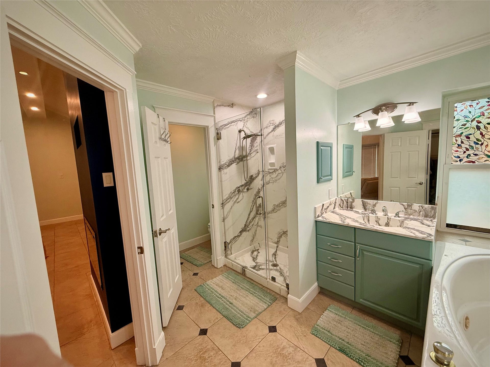 1309 Piney Woods Drive, Friendswood, TX 77546 Primary bath with large shower