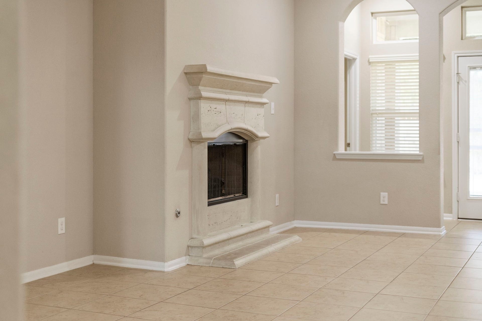 314 Trillium Drive, Sugar Land, TX 77479 A cast stone fireplace serves as the focal point of the spacious family room.