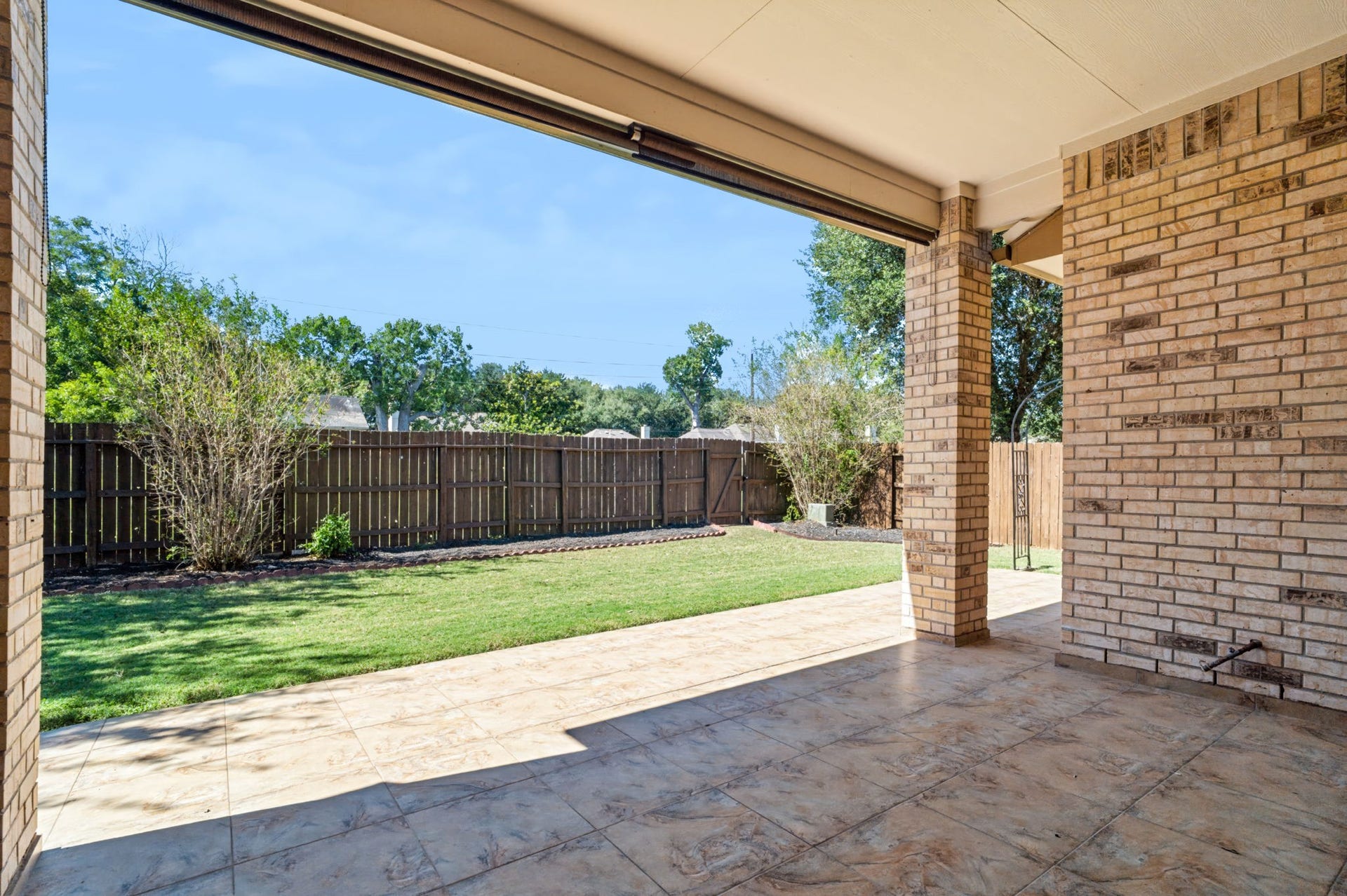 314 Trillium Drive, Sugar Land, TX 77479 Enjoy year-round outdoor dining on the covered back patio, complete with a natural gas connection for added convenience.