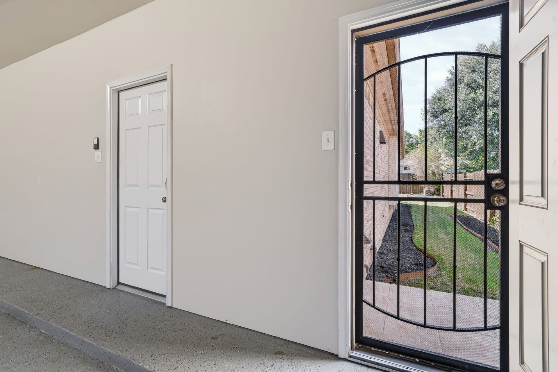 314 Trillium Drive, Sugar Land, TX 77479 Convenient access to the side yard through a door from the garage.