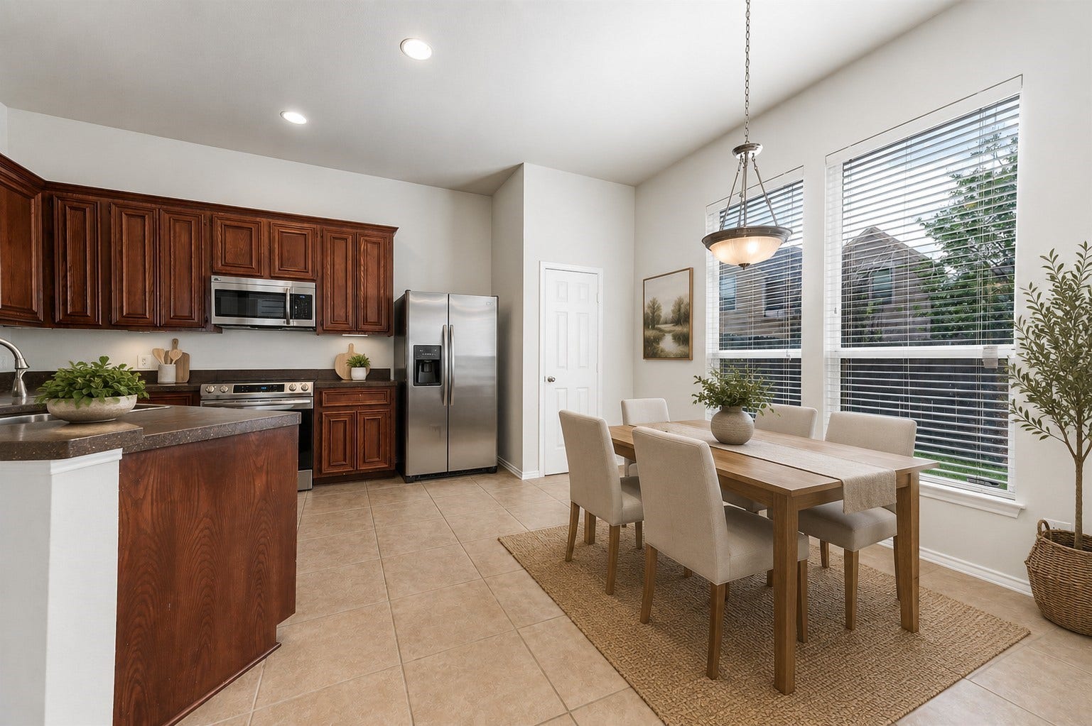 14923 ATMORE Place Dr, Houston, TX 77082 Large Kitchen windows provide views to backyard green space. Virtually staged to inspire design possibilities