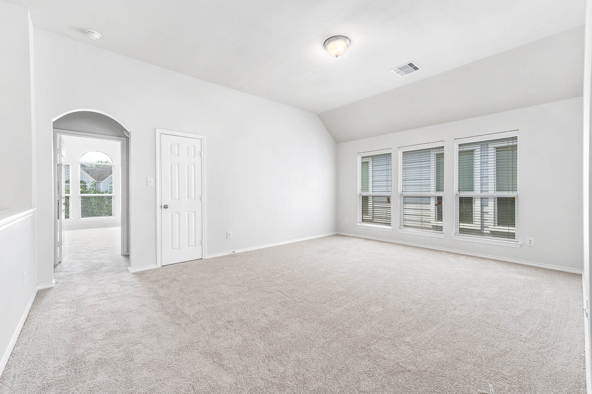 14923 ATMORE Place Dr, Houston, TX 77082 Upper Level LOFT -Use for Gameroom etc /Designer arched doorway leads into a large bonus room with closet, new carpet and fresh paint...Lots of energy efficient windows!